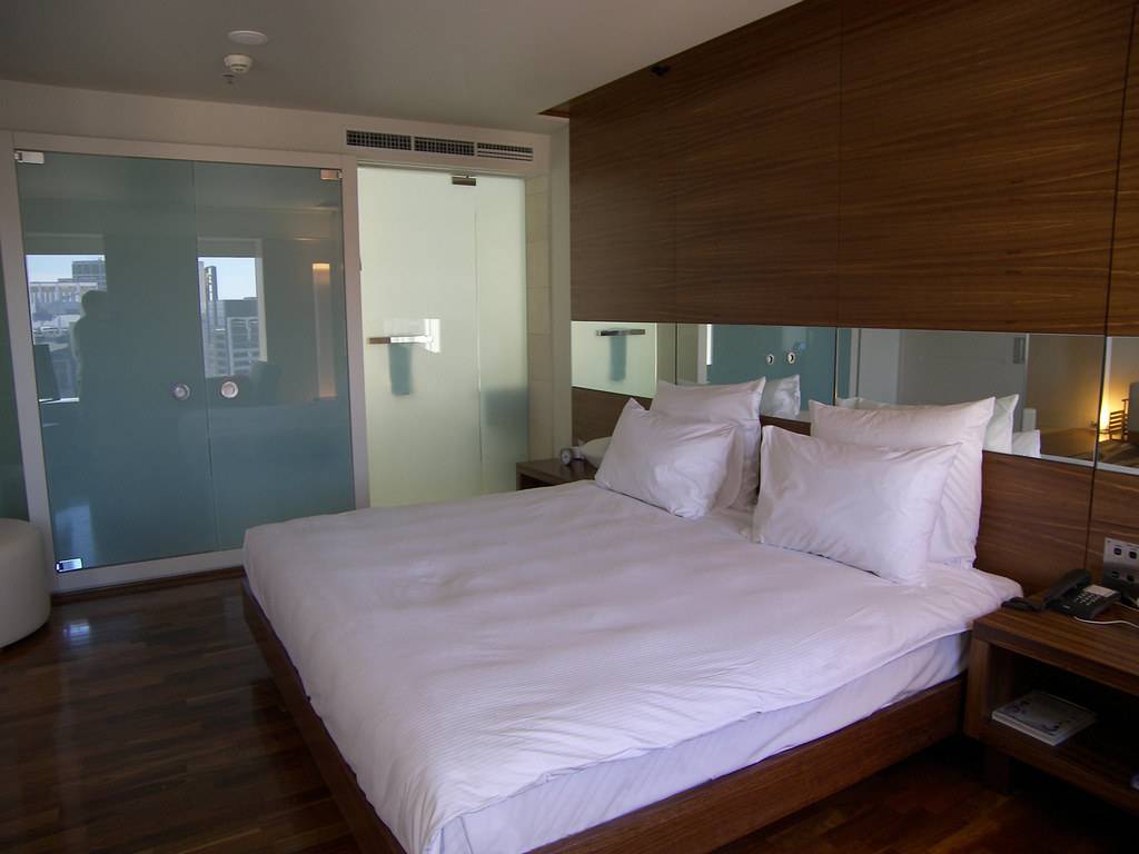 Apartment bedroom with timber floors